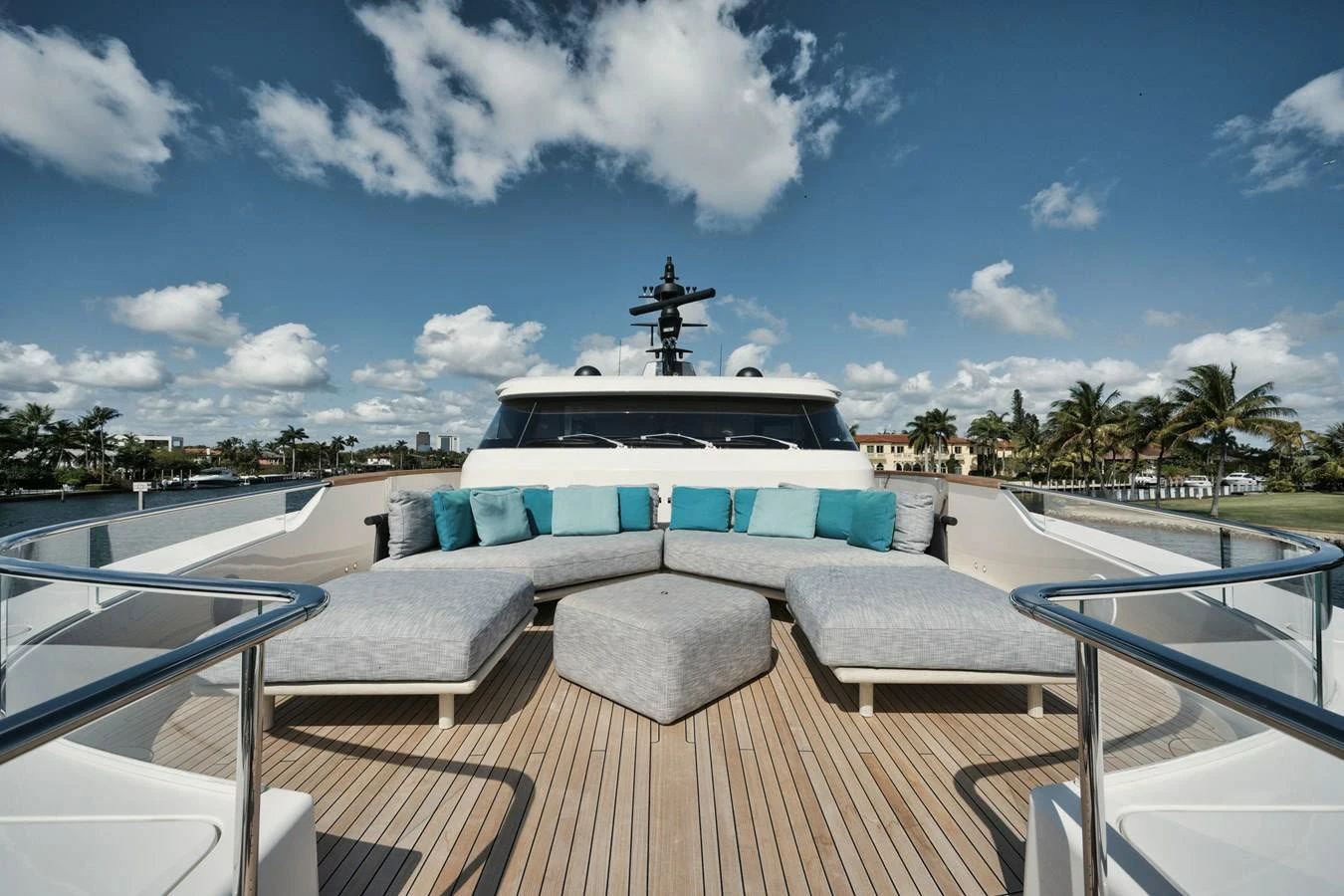 a large white boat on a dock aboard DON'T TELL MOM Yacht for Sale