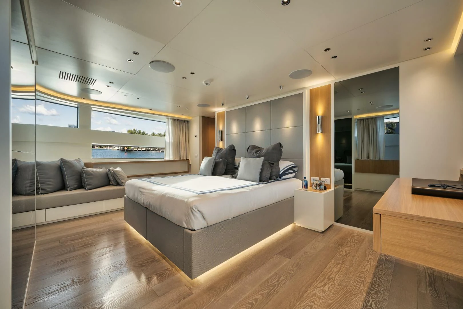a large bedroom with a large window aboard DON'T TELL MOM Yacht for Sale