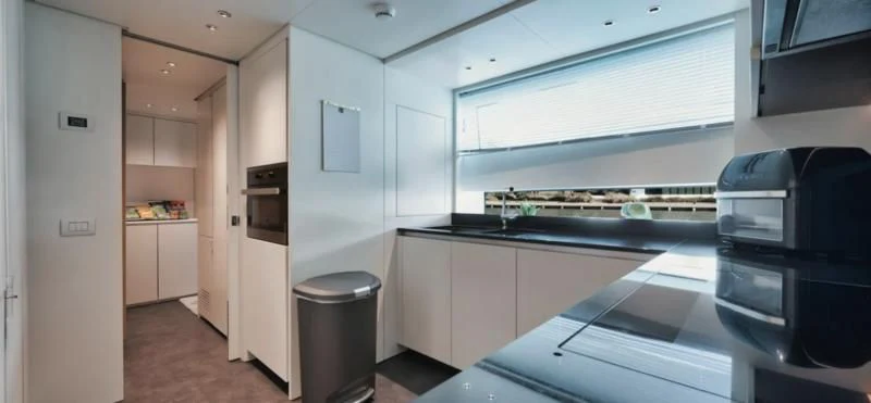 a room with a large window and a large projector screen aboard DON'T TELL MOM Yacht for Sale