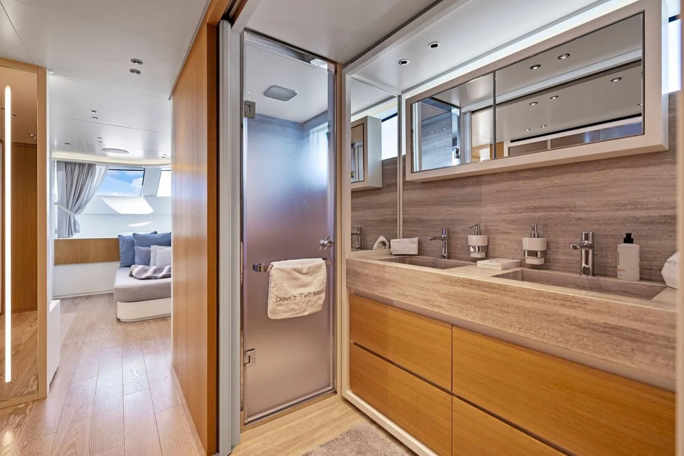a bathroom with a large mirror aboard DON'T TELL MOM Yacht for Sale