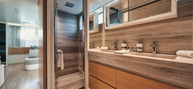 a bathroom with a large mirror aboard DON'T TELL MOM Yacht for Sale