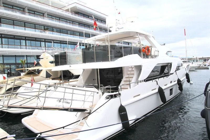 a boat docked in a harbor aboard GALA Yacht for Sale