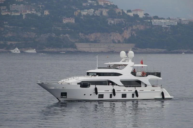 a white yacht on the water aboard GALA Yacht for Sale