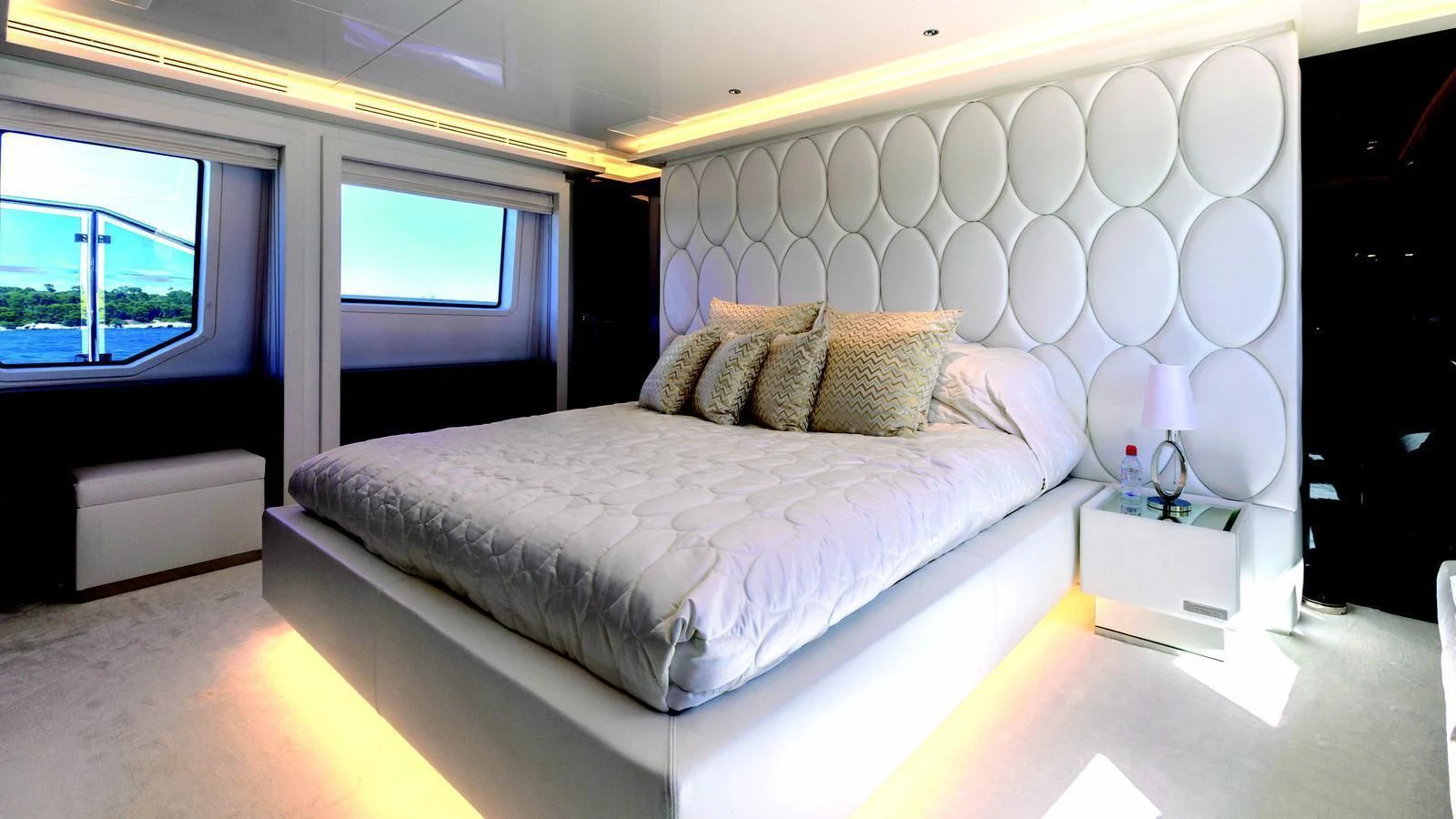 a bed in a room aboard GALA Yacht for Sale