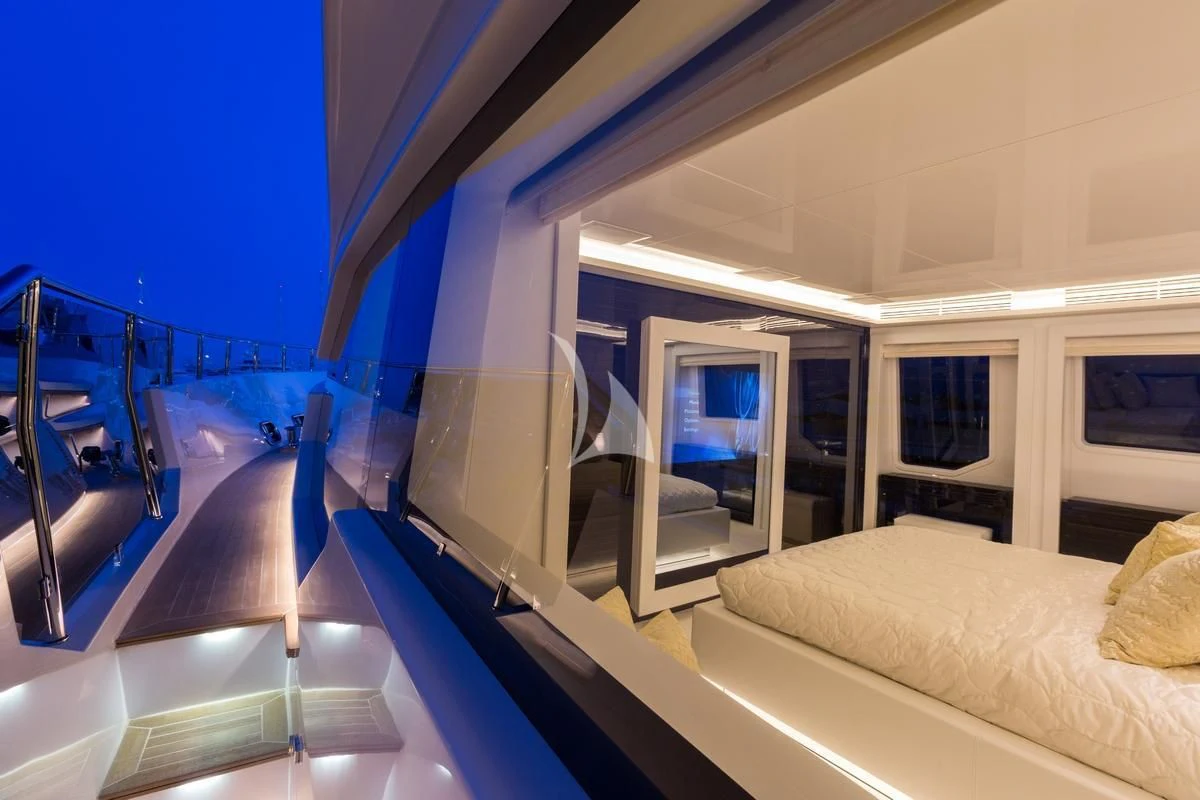 a room with a bed and a railing aboard GALA Yacht for Sale