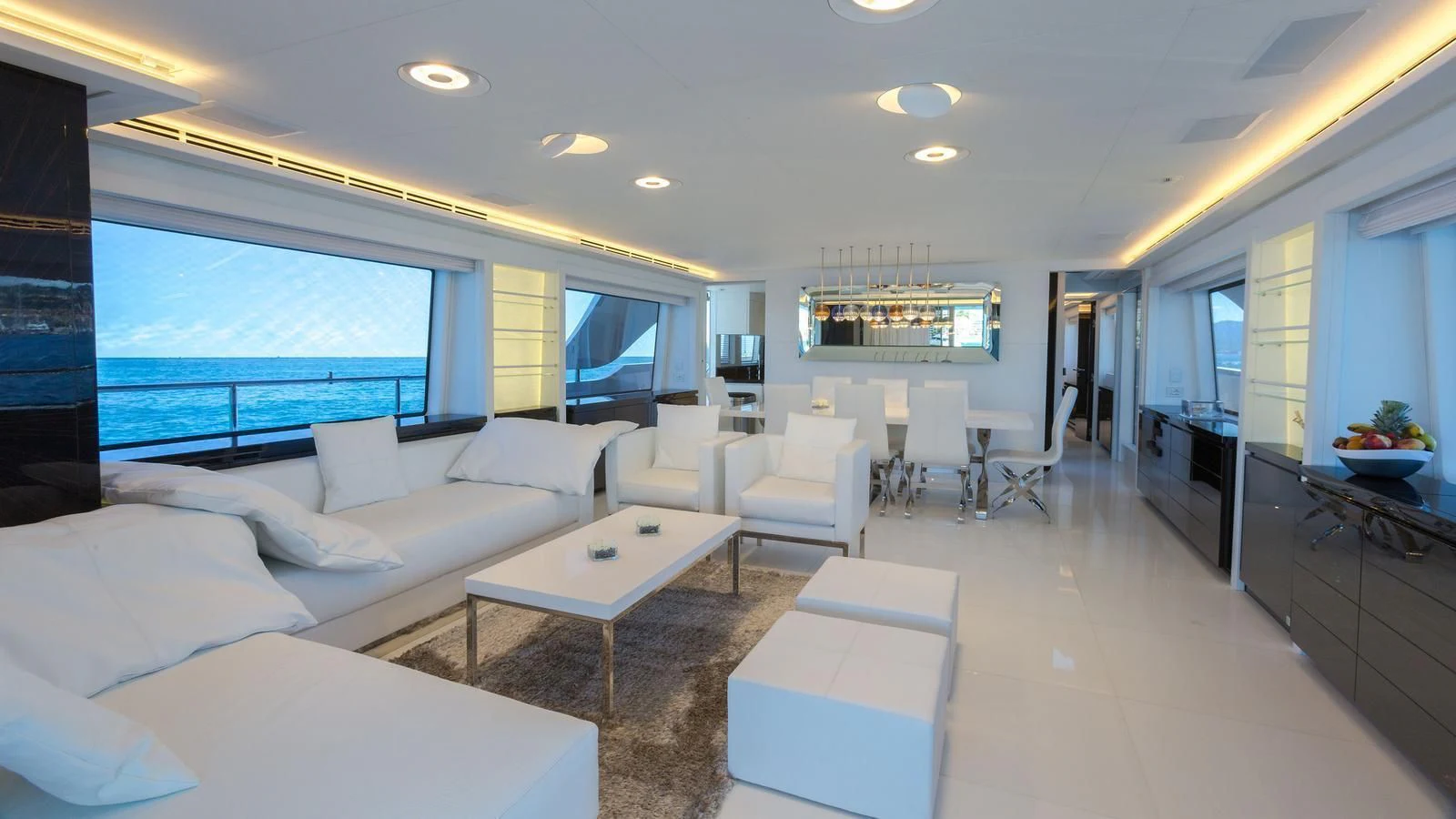a living room with a large window aboard GALA Yacht for Sale