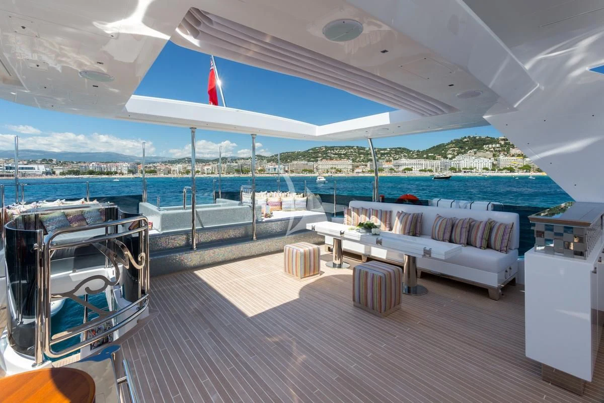 a large lounge area with a pool aboard GALA Yacht for Sale
