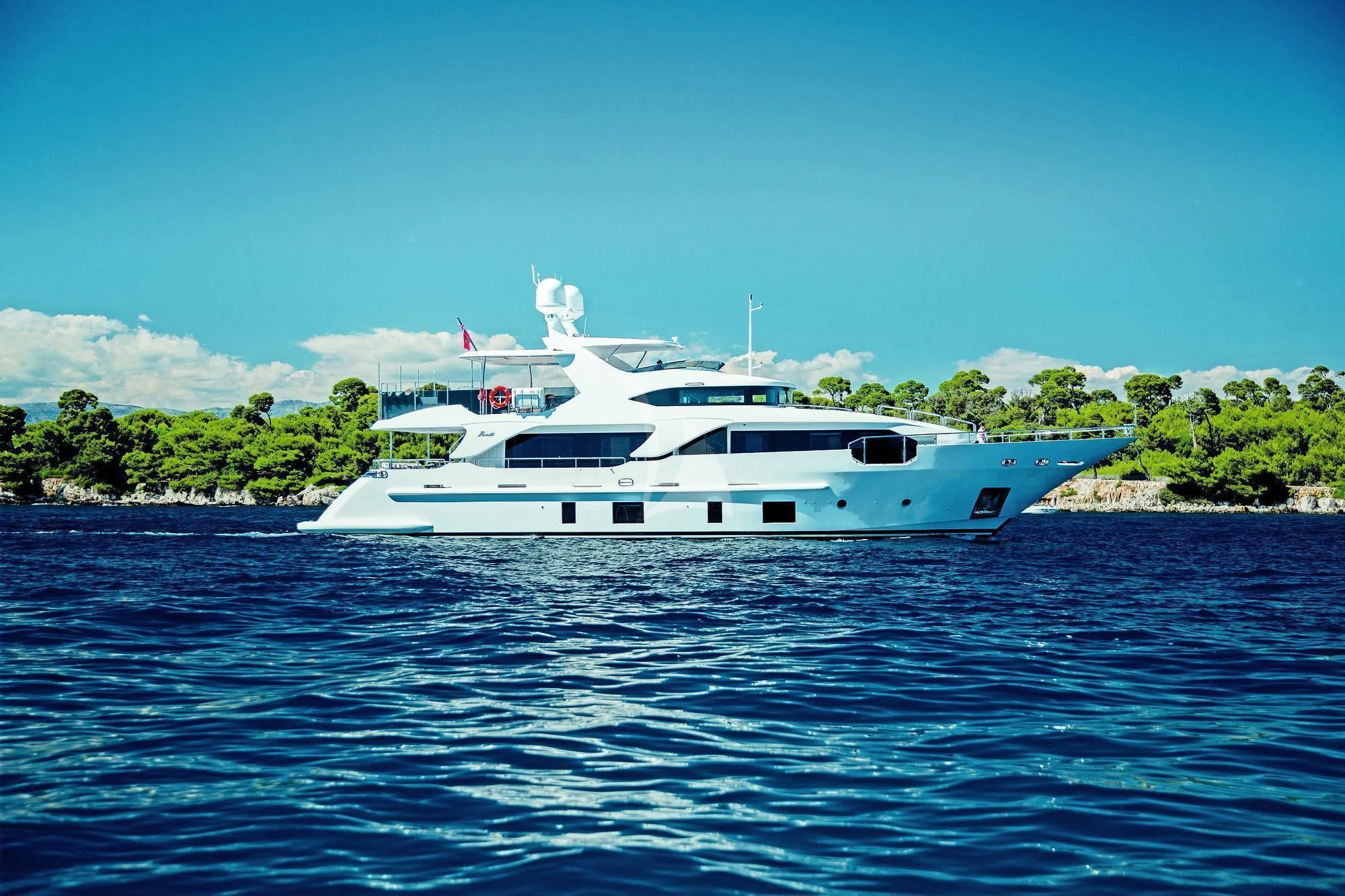 a white yacht in the water aboard GALA Yacht for Sale