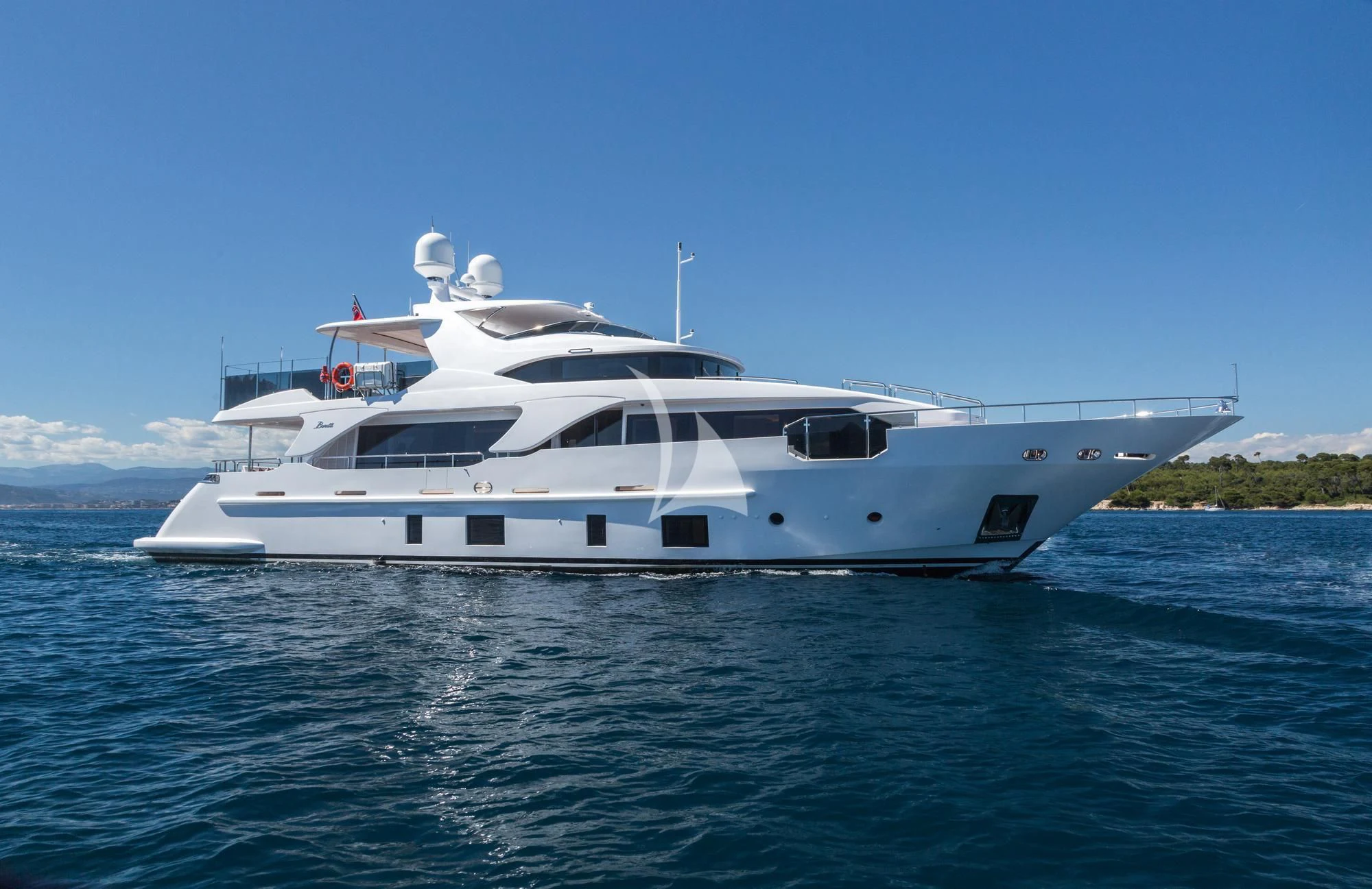 a white yacht on the water aboard GALA Yacht for Sale