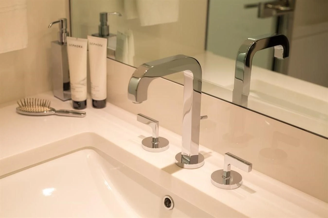 a bathroom sink with a faucet aboard GALA Yacht for Sale