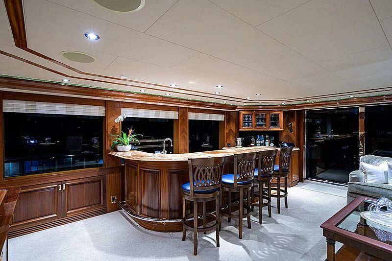 a kitchen with a dining table aboard BLUE TIME Yacht for Sale