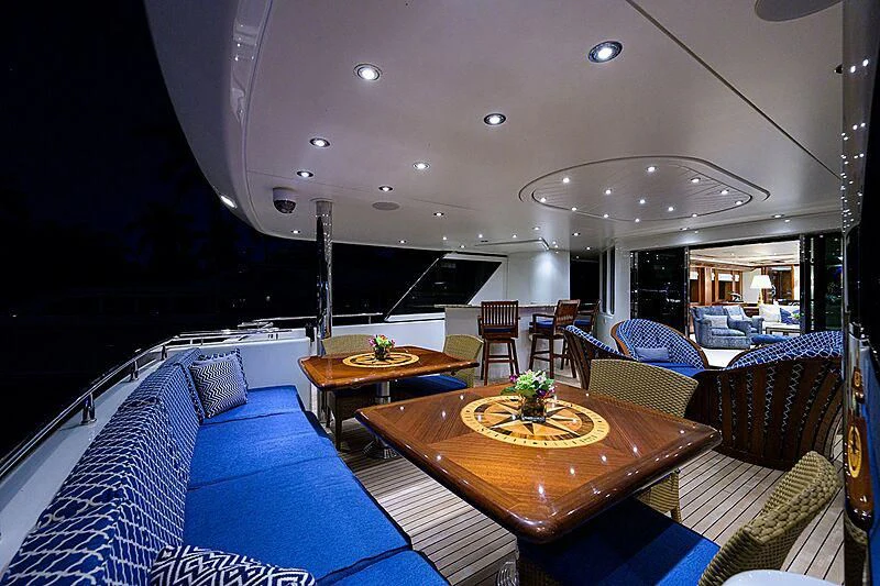 a room with a table and chairs aboard BLUE TIME Yacht for Sale