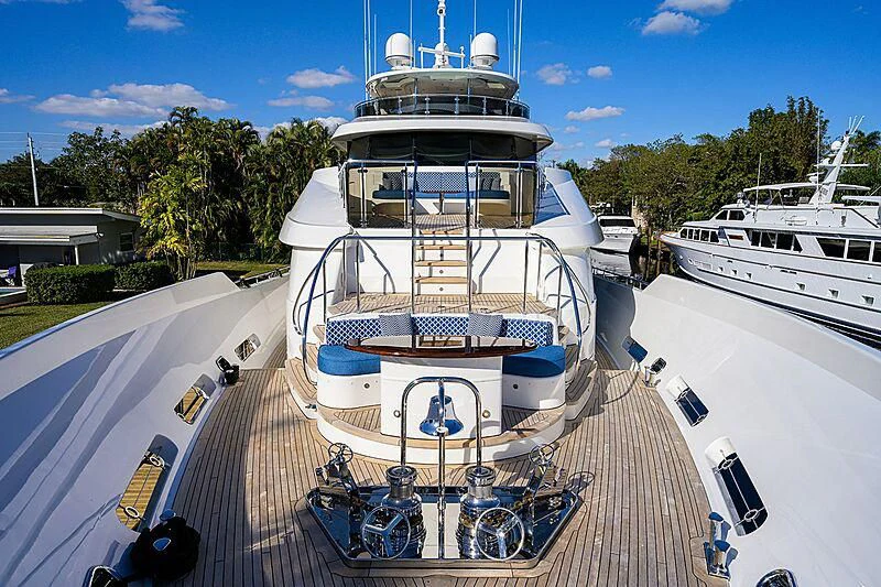 a large boat docked at a pier aboard BLUE TIME Yacht for Sale