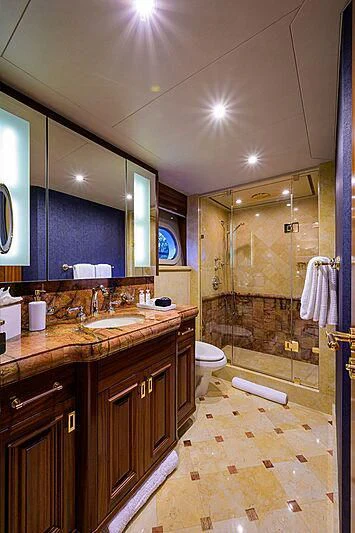 a bathroom with a sink and a shower aboard BLUE TIME Yacht for Sale