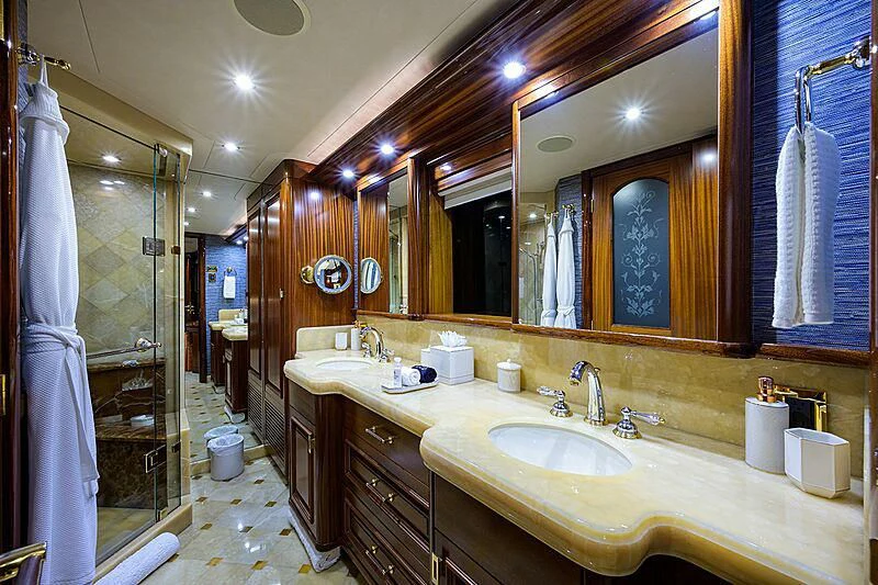 a bathroom with a large mirror aboard BLUE TIME Yacht for Sale