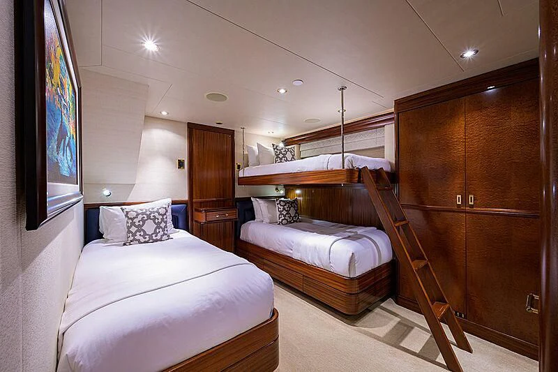 a couple of beds in a room aboard BLUE TIME Yacht for Sale