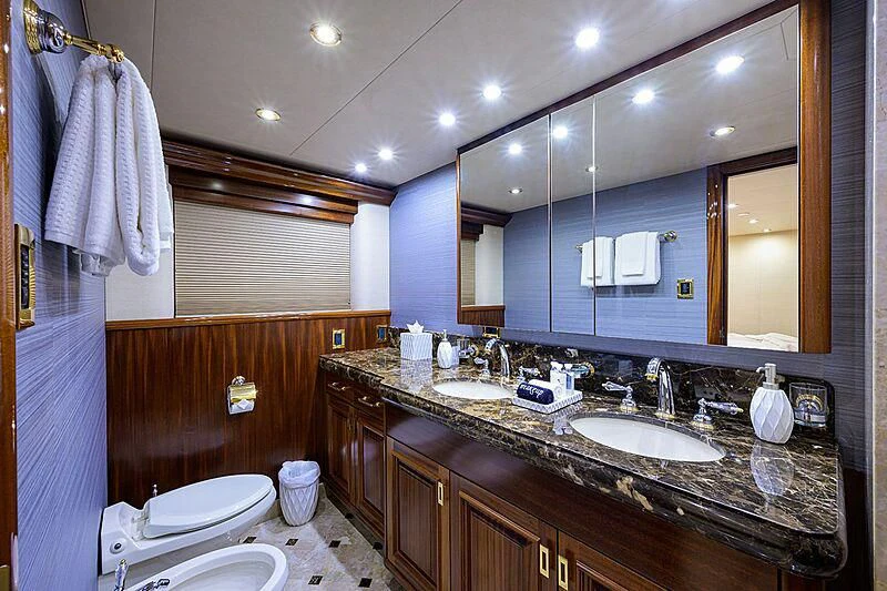a bathroom with a large mirror aboard BLUE TIME Yacht for Sale
