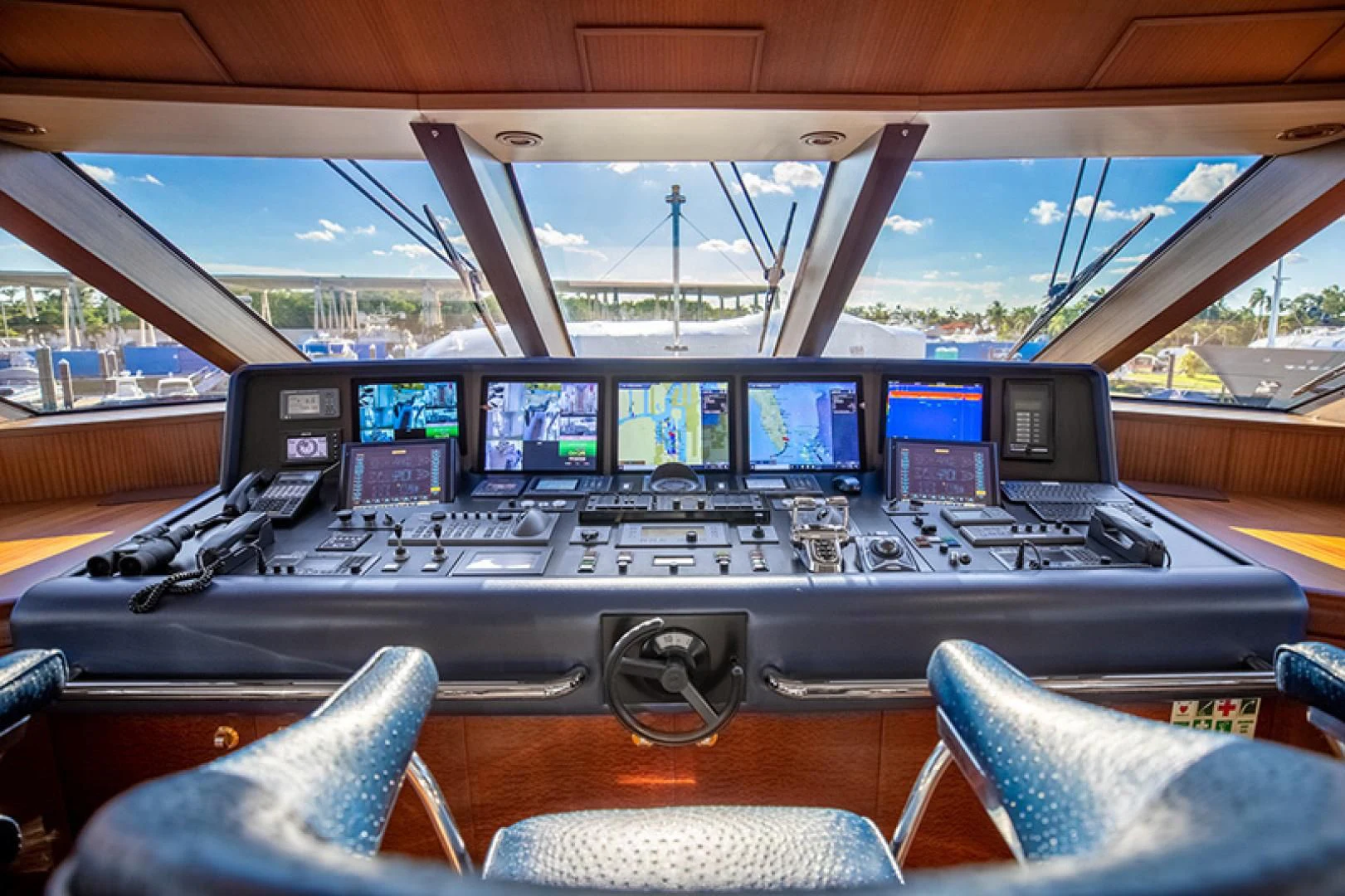 inside of a vehicle with many monitors aboard NEVER ENOUGH Yacht for Charter
