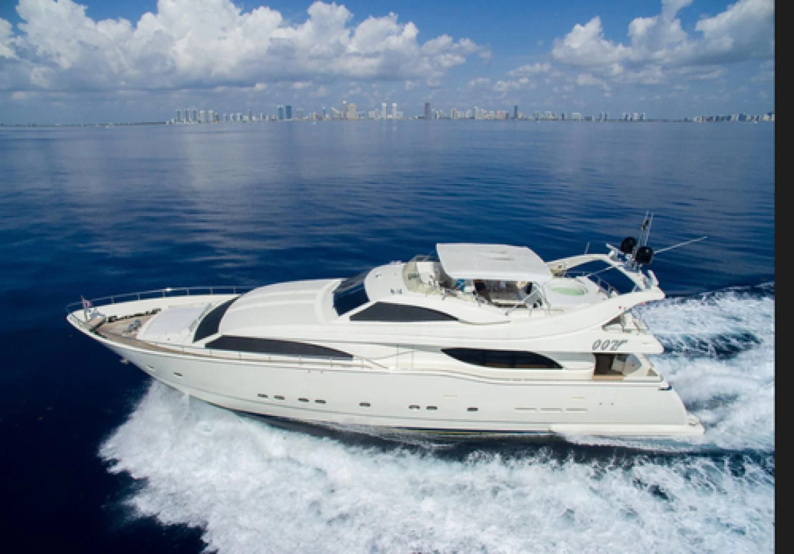 a white yacht on the water aboard NEVER ENOUGH Yacht for Charter