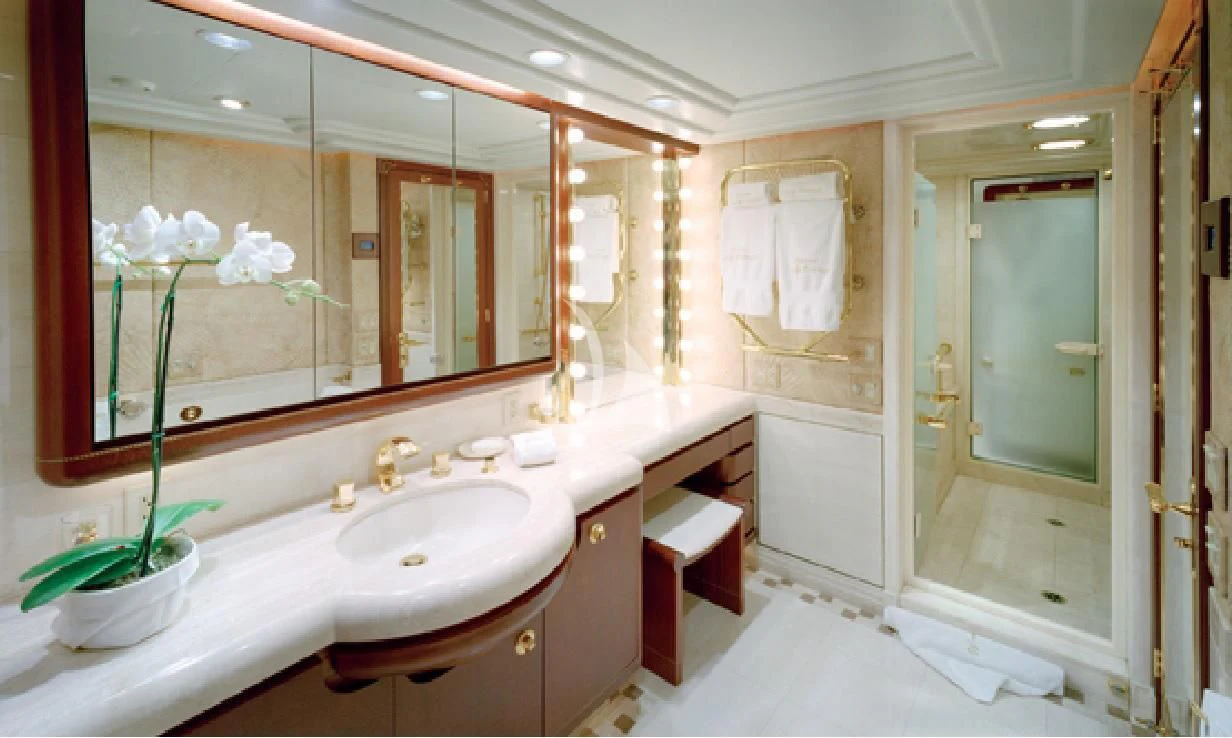 a bathroom with a large mirror aboard NEVER ENOUGH Yacht for Charter