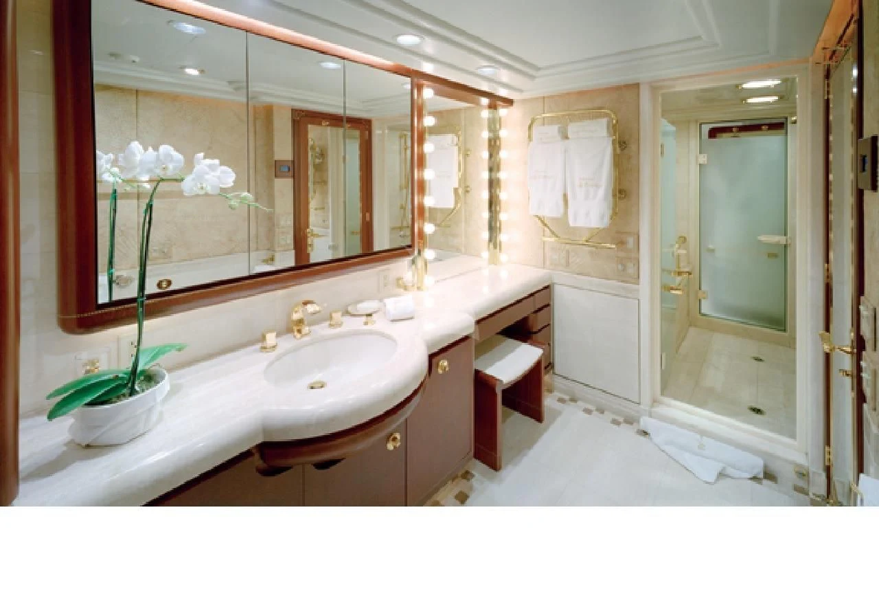 a bathroom with a large mirror aboard NEVER ENOUGH Yacht for Charter