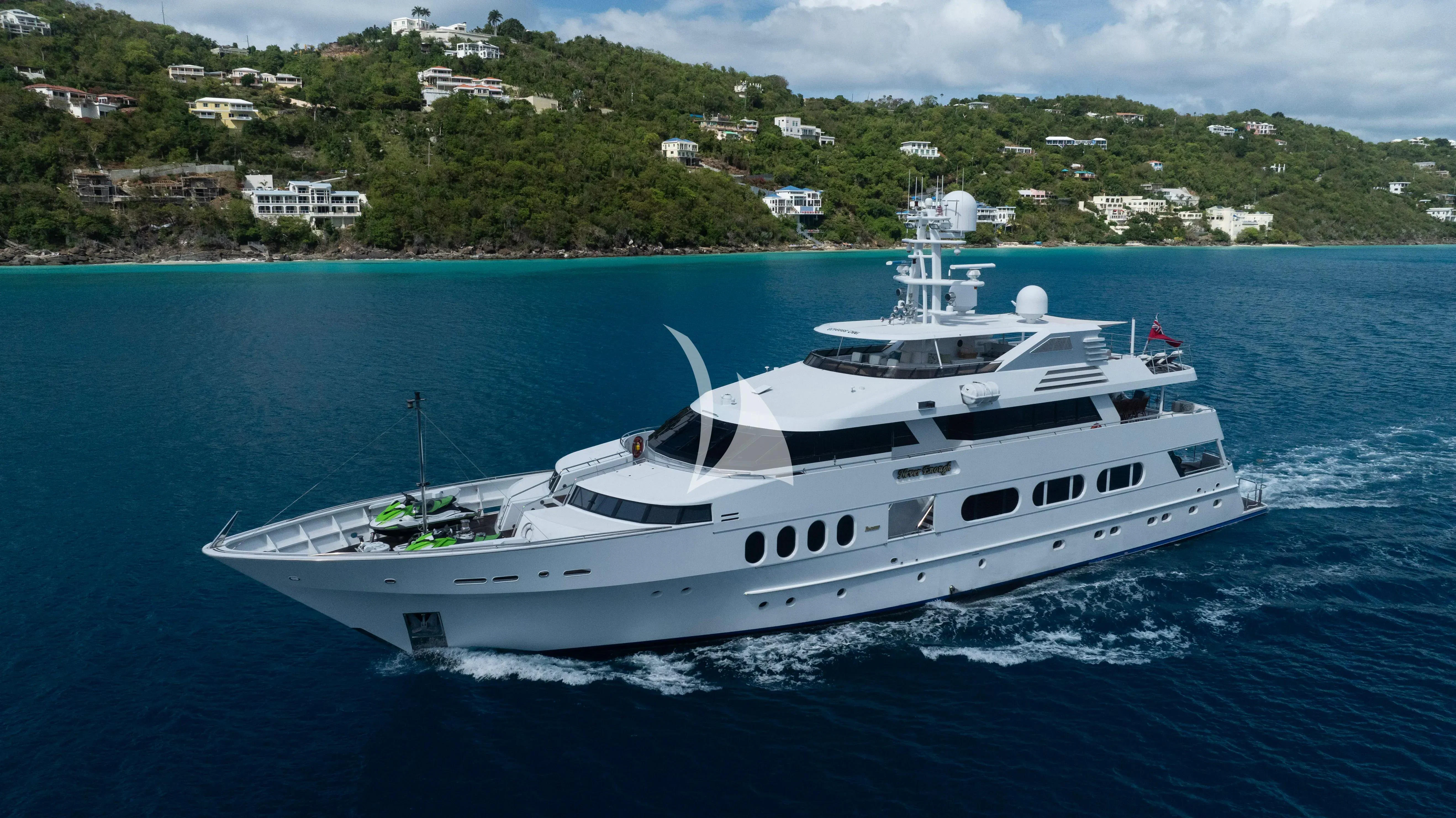 a white yacht in the water aboard NEVER ENOUGH Yacht for Charter