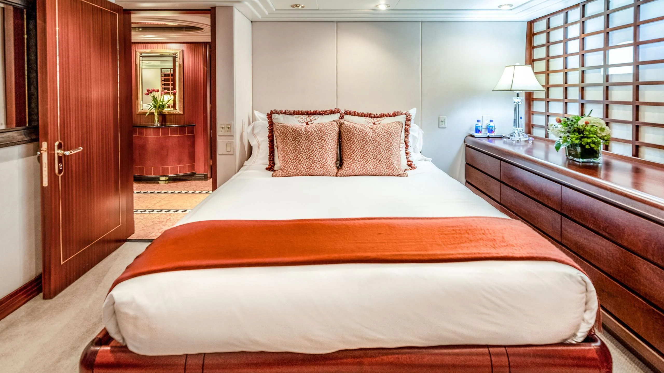 a large bed in a hotel room aboard NEVER ENOUGH Yacht for Charter