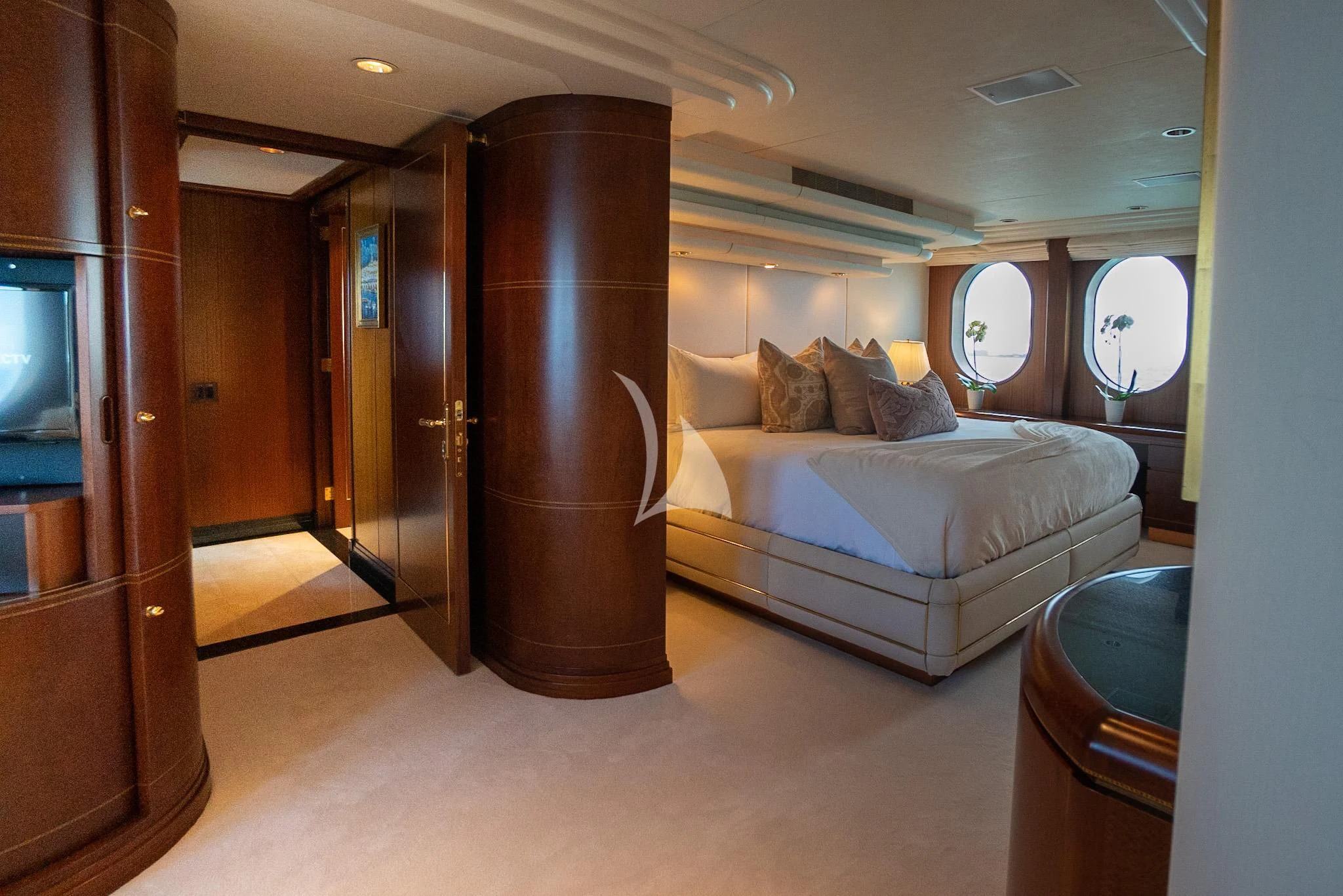 a bed in a room aboard NEVER ENOUGH Yacht for Charter