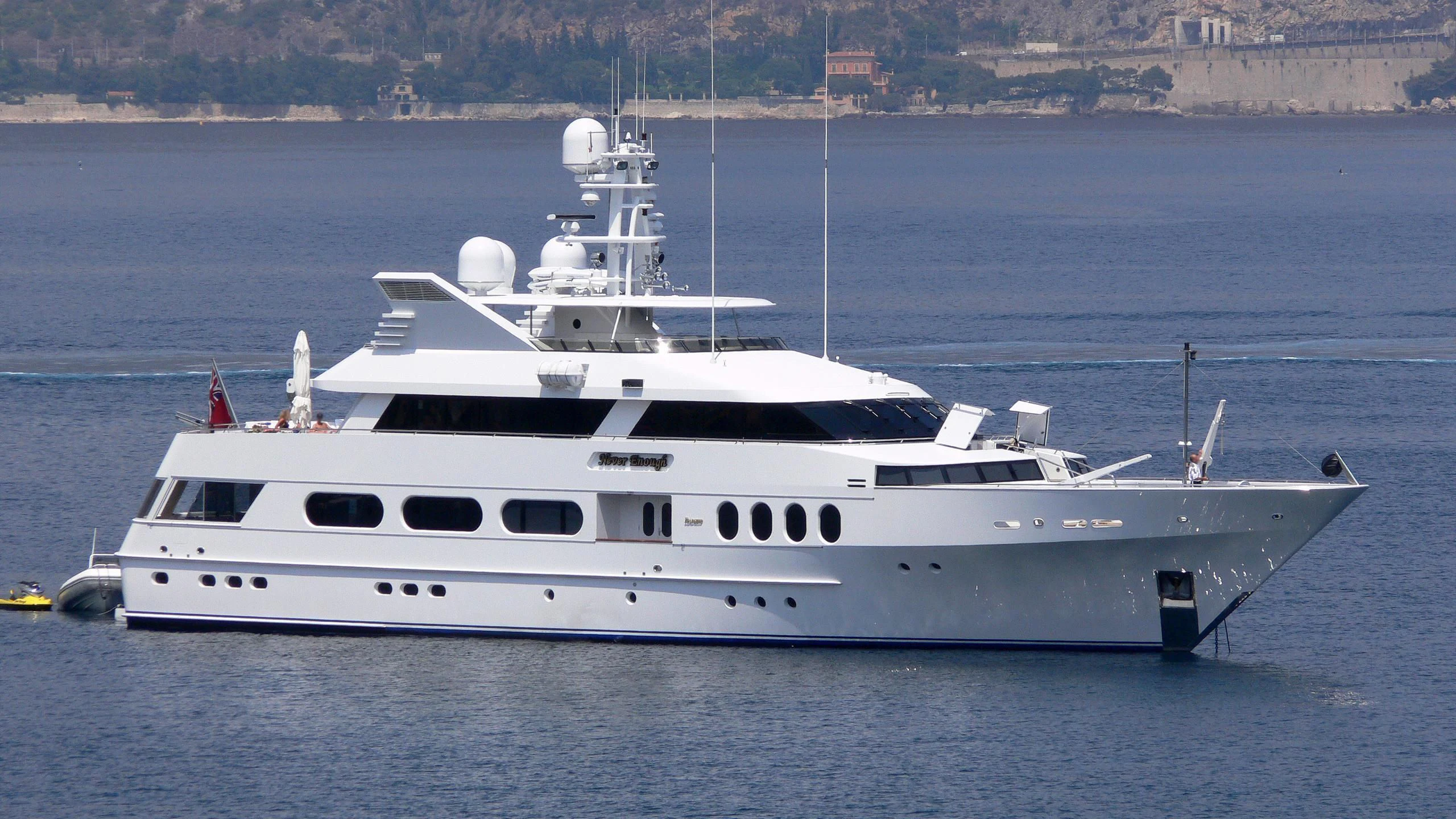 a white yacht in the water aboard NEVER ENOUGH Yacht for Charter