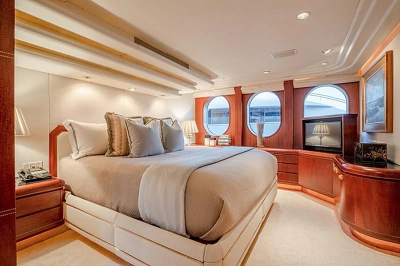 a bed in a room aboard NEVER ENOUGH Yacht for Charter