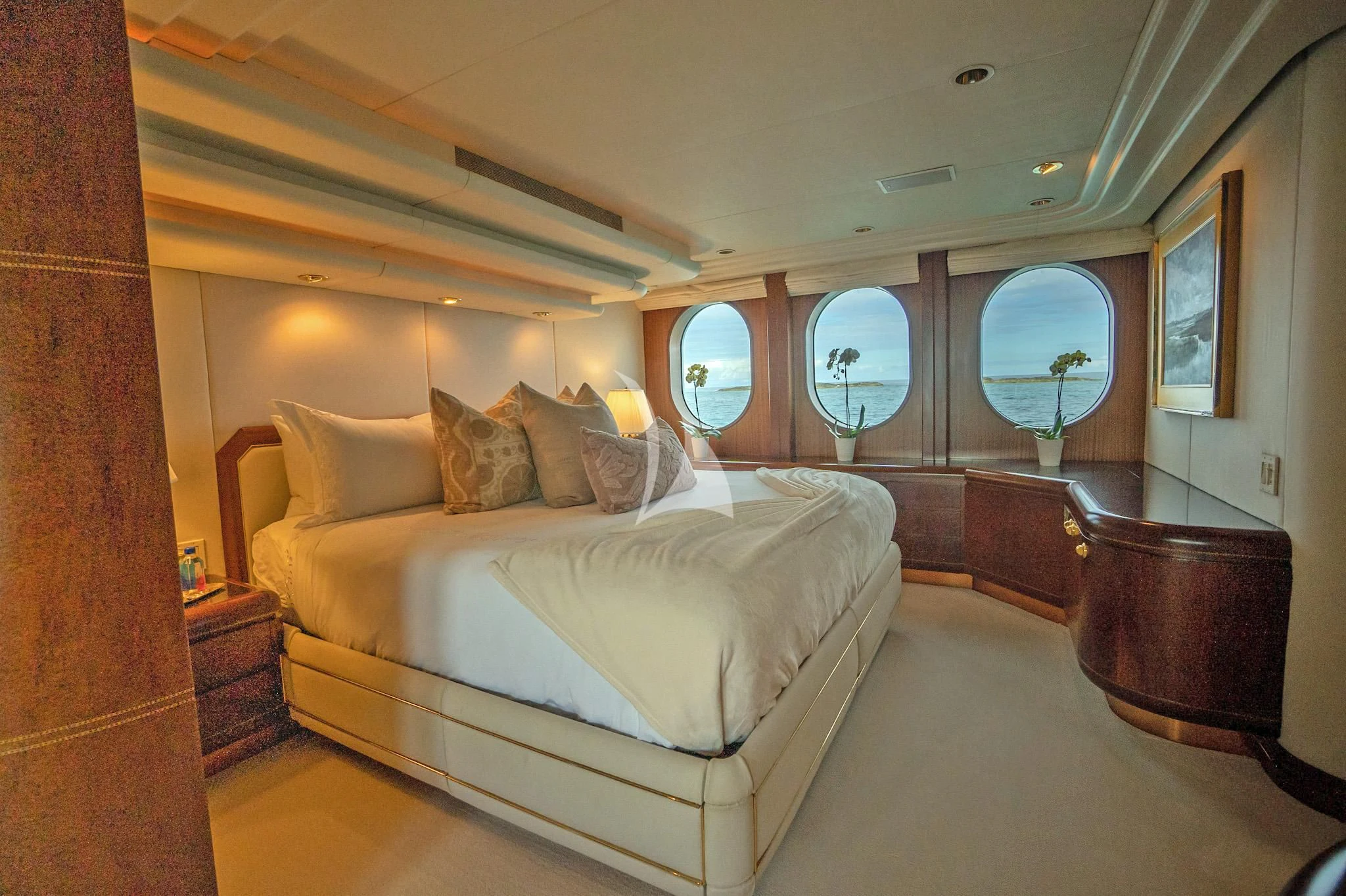 a bed in a room aboard NEVER ENOUGH Yacht for Charter