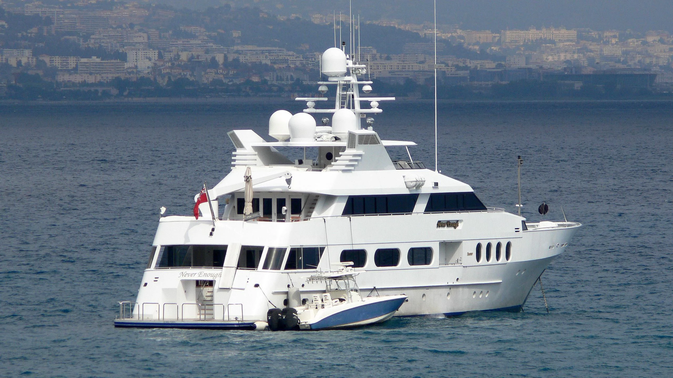 a white yacht on the water aboard NEVER ENOUGH Yacht for Charter