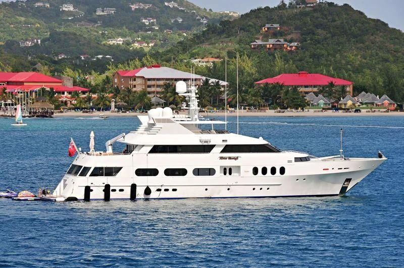 a white yacht in the water aboard NEVER ENOUGH Yacht for Charter