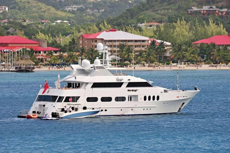 a white yacht on the water aboard NEVER ENOUGH Yacht for Charter