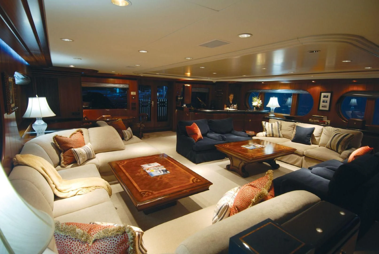 a living room with a couch and a table aboard NEVER ENOUGH Yacht for Charter