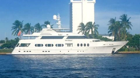 a large white cruise ship aboard NEVER ENOUGH Yacht for Charter
