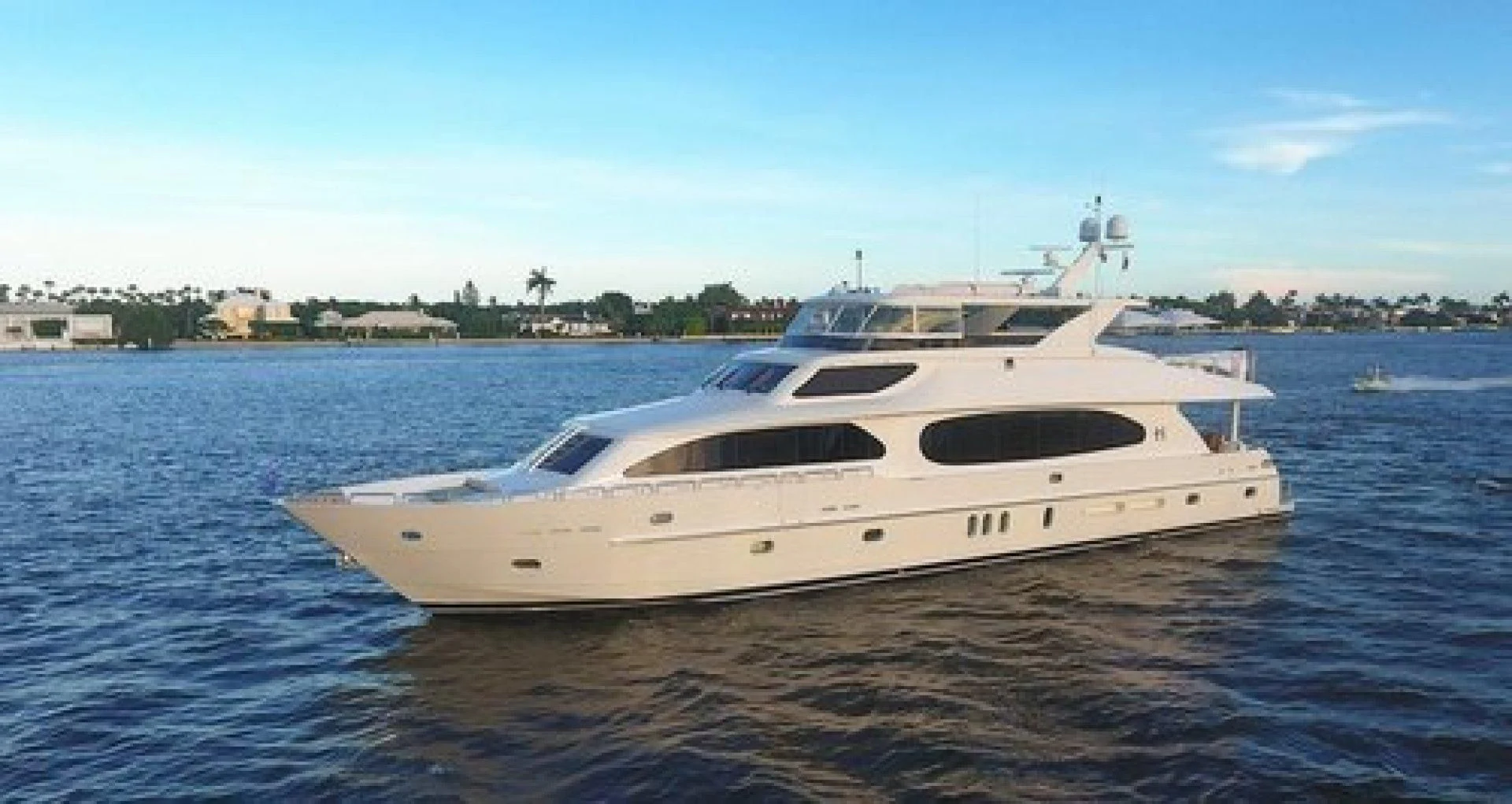 a white yacht on the water aboard NEVER ENOUGH Yacht for Charter