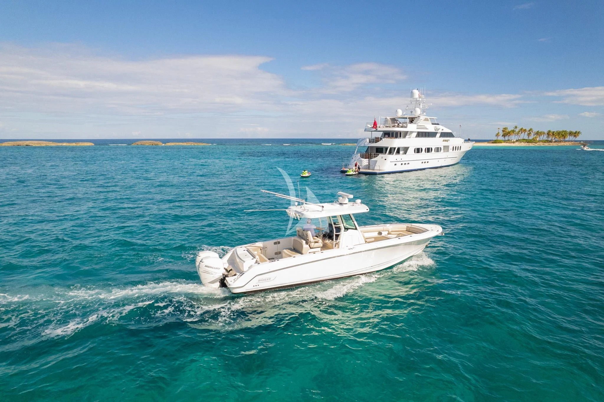 a couple of boats in the water aboard NEVER ENOUGH Yacht for Charter
