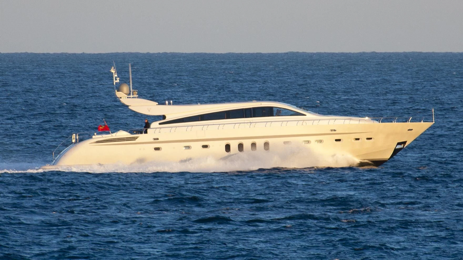 a white yacht in the water aboard JADE Yacht for Sale