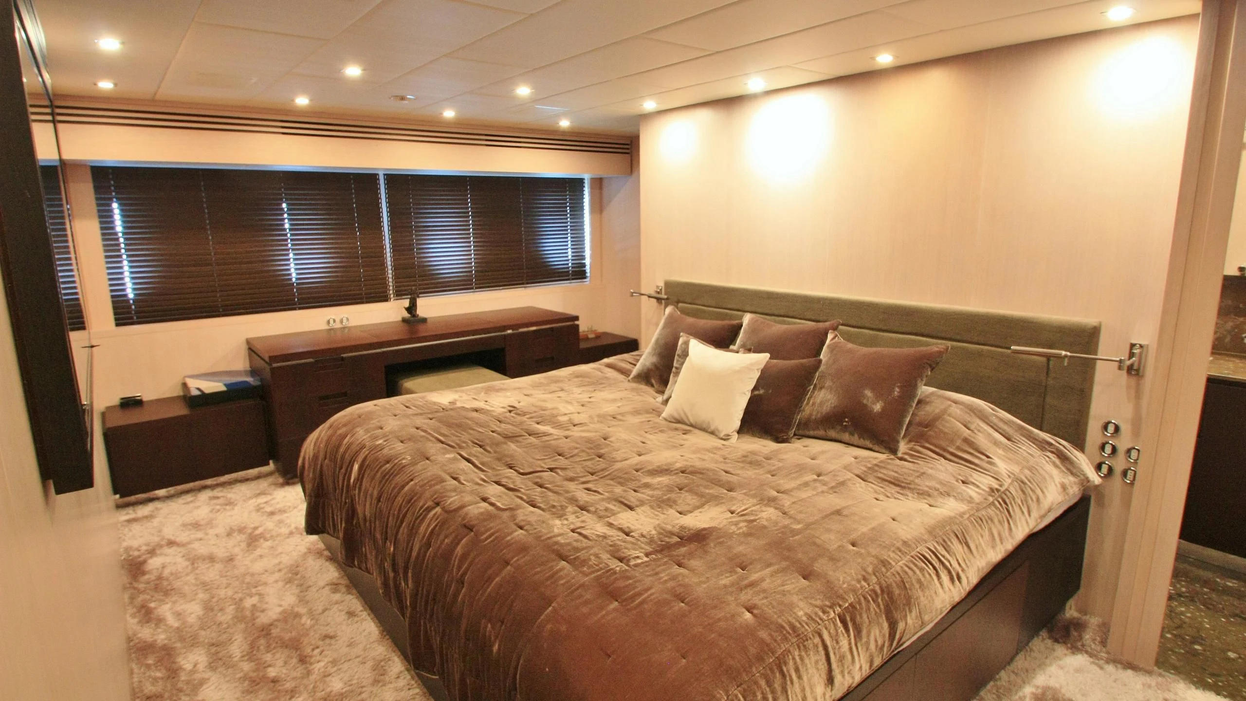 a bed in a room aboard JADE Yacht for Sale