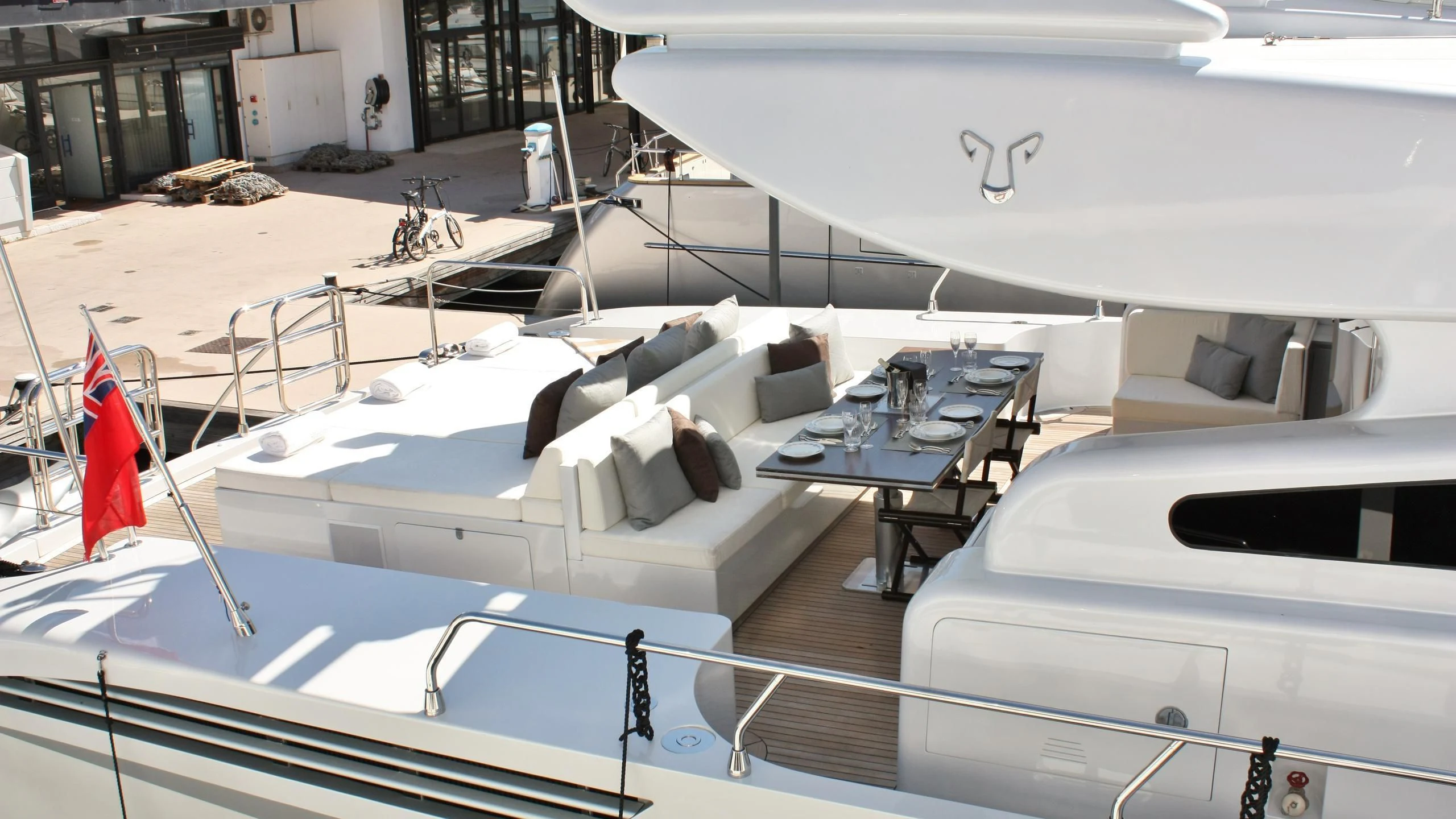 a room with white beds and white walls aboard JADE Yacht for Sale