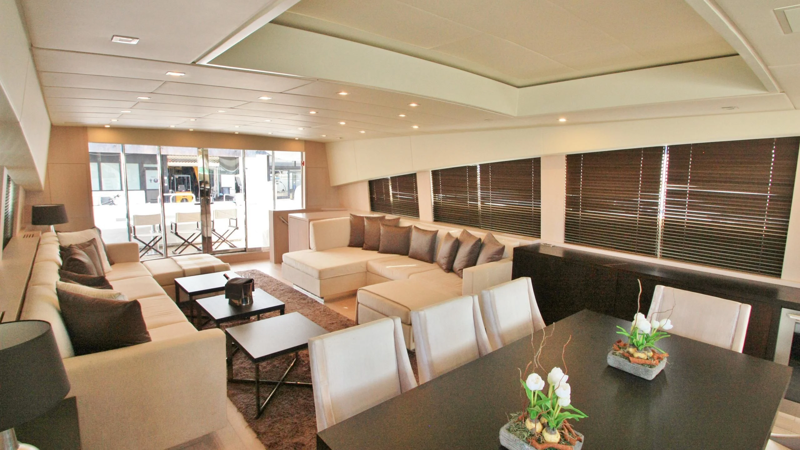 a living room with a large window aboard JADE Yacht for Sale