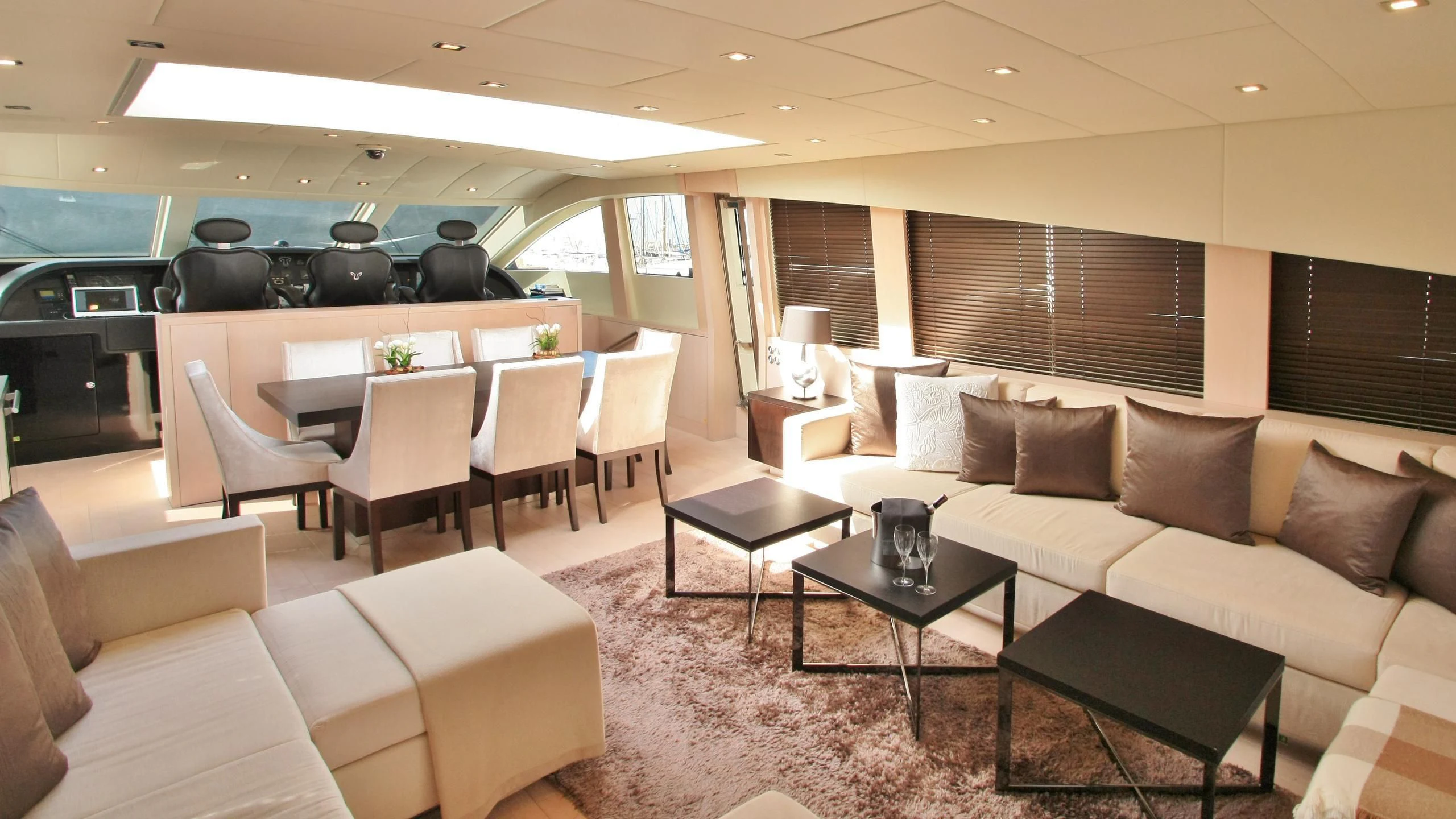 a living room with a couch and a table aboard JADE Yacht for Sale