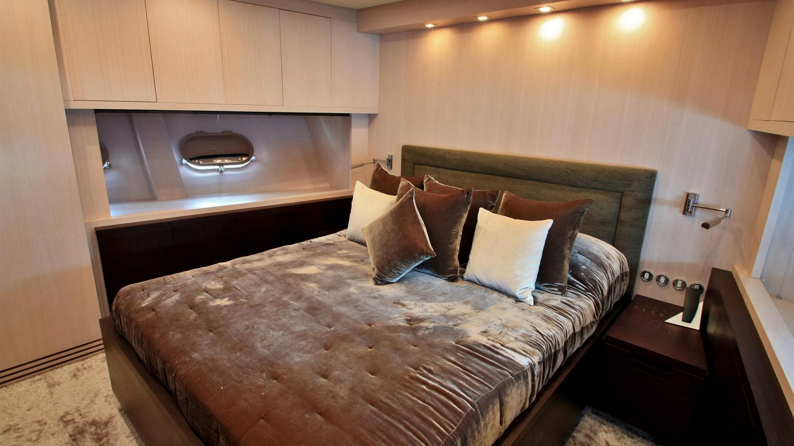 a bed in a room aboard JADE Yacht for Sale