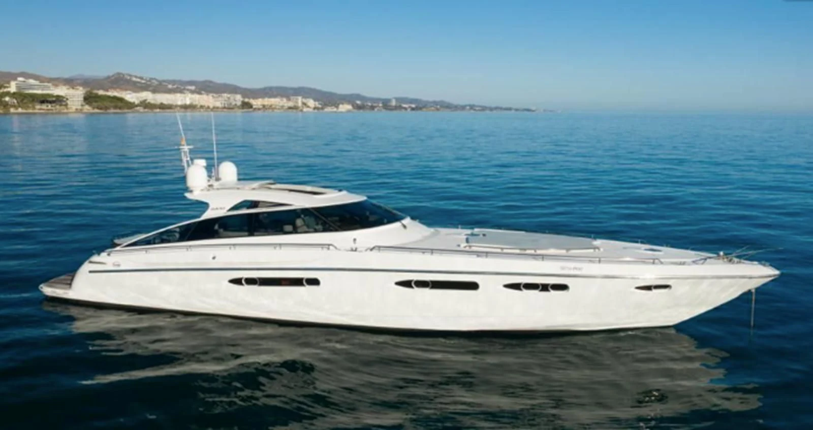 a white yacht in the water aboard 4F Yacht for Sale
