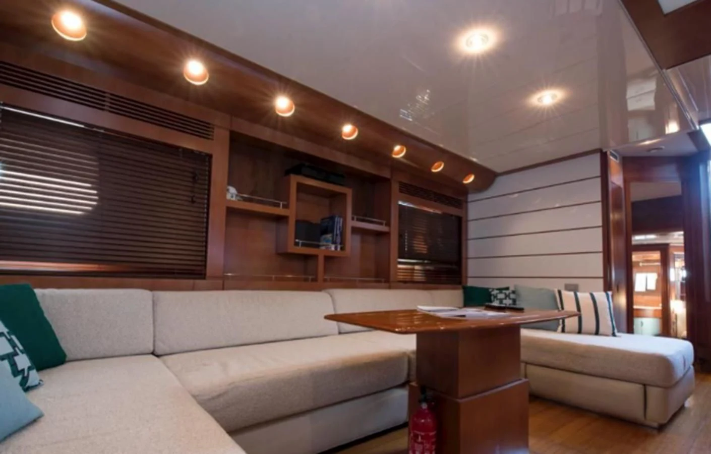 a living room with a couch and a coffee table aboard 4F Yacht for Sale