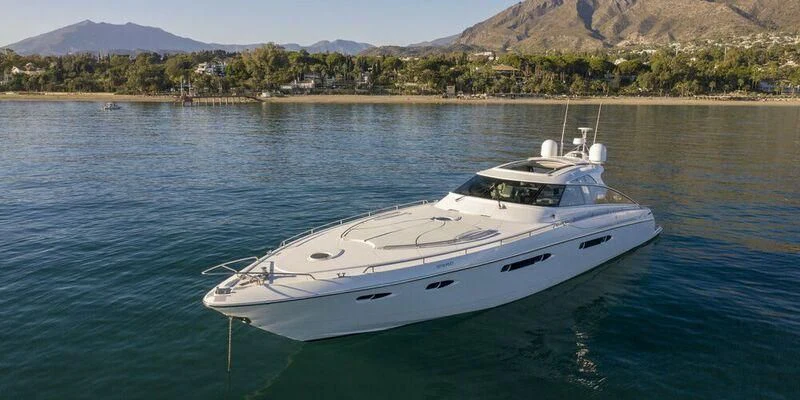 a white boat in the water aboard 4F Yacht for Sale