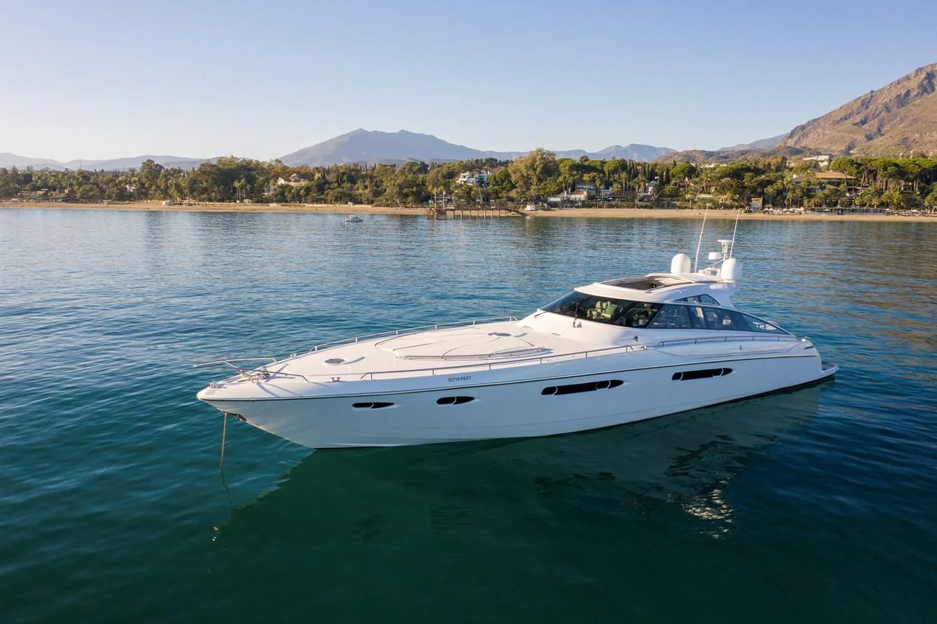 a white yacht in the water aboard 4F Yacht for Sale