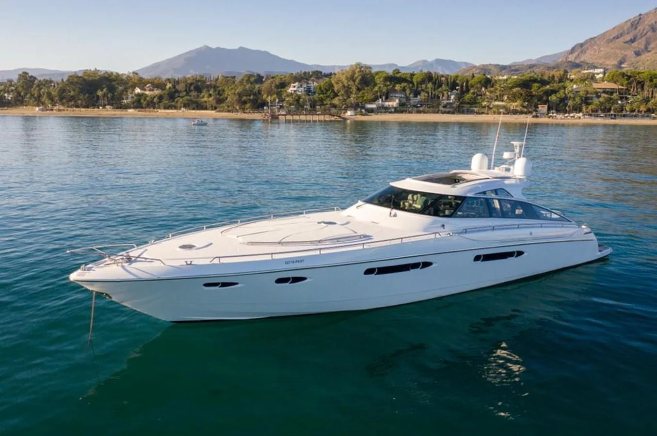 a white yacht in the water aboard 4F Yacht for Sale