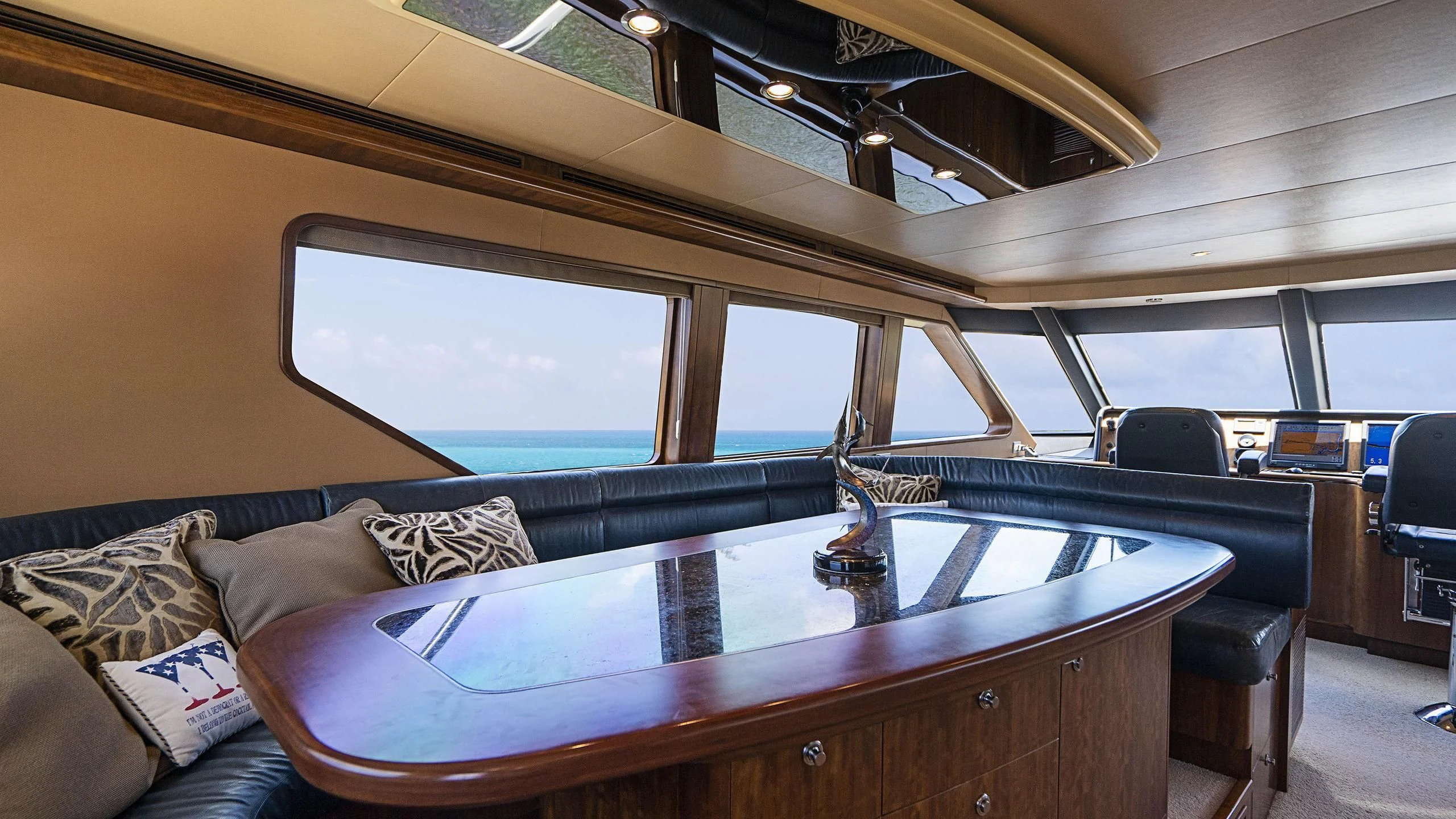 a table in a room aboard GRAND LEGACY Yacht for Sale
